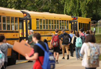 Students head for the buses at Joel Barlow High School in Redding, Conn. on Thursday, September 29, 2016.